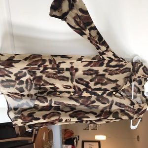 Leopard print blouse with shoulder cut outs